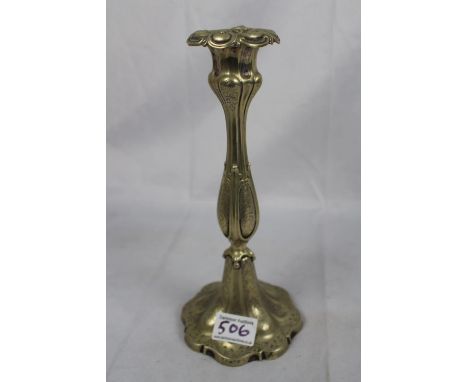 Plated metal candlestick with decorative chasing, ht 25cm 