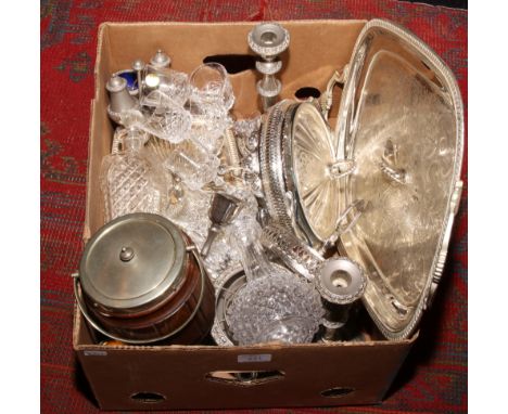 A box of silver plate and glassware to include twin handle serving tray, candlesticks, French crystal decanter and drinking g