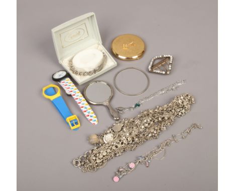 A quantity of costume jewellery including a belly dancers white metal belt, white metal identity bracelet, white paste buckle