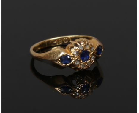 An early 20th century 18ct gold sapphire and diamond ring, size K.