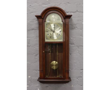 A Acctim 31 day wall clock chiming on a coiled gong.