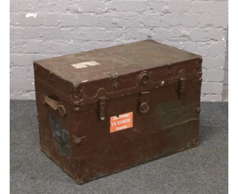 A vintage painted metal bound trunk.