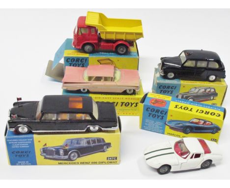 5 Corgi Toys. Marcos 1800 G.T. with Volvo engine (324) in white with red interior. Plus a Chevrolet Impala (220) in pink (fad