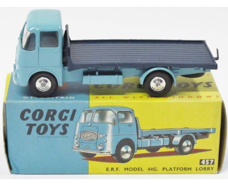 A Corgi Toys E.R.F. Model 44G Platform Lorry (457). Light blue cab and chassis with dark metallic blue rear loadbed. Boxed, m