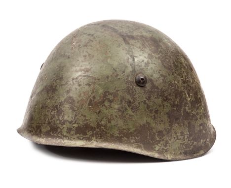 A WWII period Russian steel helmet, dark apple green with leather lining and chinstrap. GC (service wear overall). Plate 5