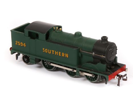 A scarce Hornby-Dublo class N2 0-6-2 tank locomotive. In Southern green livery, RN 2594. An example converted from 3 rail to 