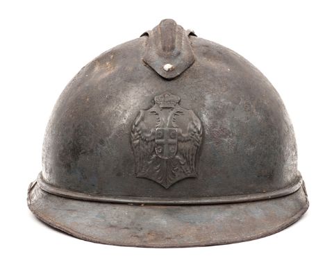 A rare WWI Serbian Adrian pattern steel helmet, with grey painted finish, pressed steel Serbian arms badge to the front, leat