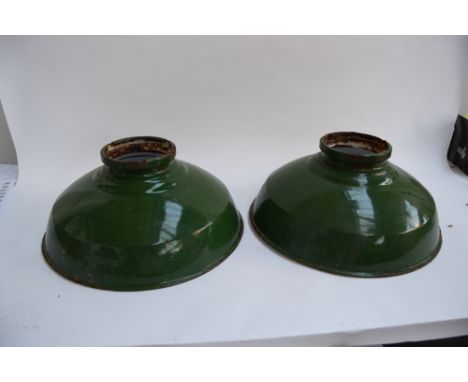 A pair of large vintage industrial light shades in green enamel, 46cm diameter