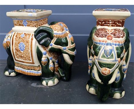 Two large ceramic elephants