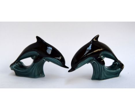 A pair of Poole pottery dolphins