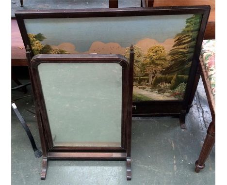 A mahogany toilet mirror and an embroidered fire screen