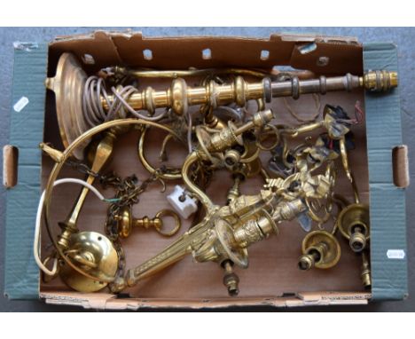 Three brass sconces, each with two scrolling arms, along with a further two lamp brass wall light, two single lamp brass wall