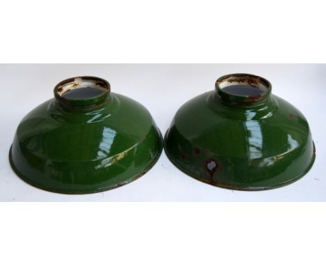 A pair of large vintage industrial light shades in green enamel, 46cm diameter