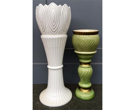 Two ceramic planters, one white, one green, with associated stands