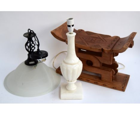 A glass ceiling light, together with a marble table lamp base, and a teak stool