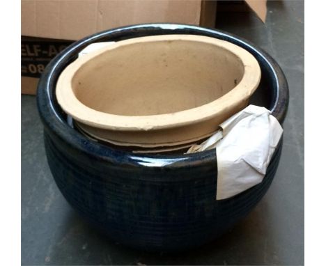 Two glazed ceramic planters