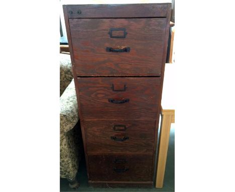 A vintage stained pine four drawer filing cabinet, 130cmH