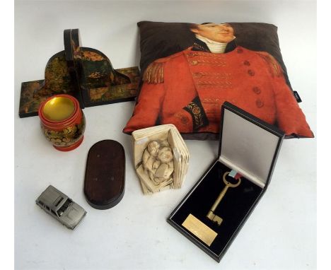 A National Portrait Gallery cushion along with a set of book ends and other items