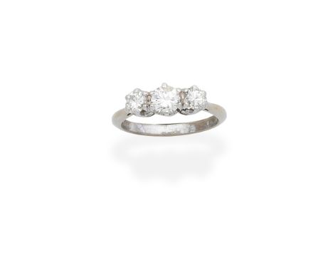 DIAMOND THREE-STONE RINGThe brilliant-cut diamonds, mounted in 18 carat white gold, diamonds approx. 0.90ct total, London hal