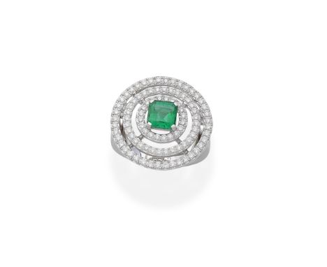 GRAFF: EMERALD AND DIAMOND TARGET RINGThe central step-cut emerald, weighing 1.03 carats, within concentric circles of brilli