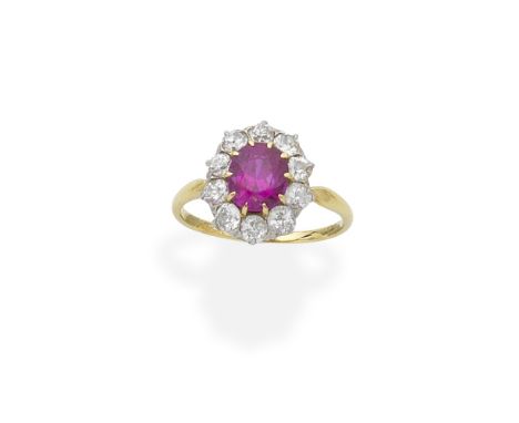RUBY AND DIAMOND CLUSTER RING AND BRACELETThe ring with an oval-shaped ruby within a surround of old brilliant-cut diamonds, 