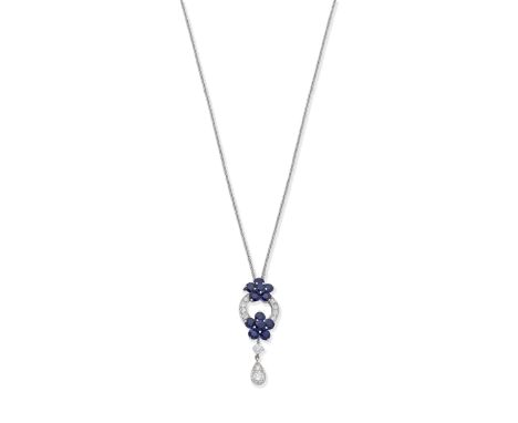 GRAFF: SAPPHIRE AND DIAMOND 'ROSETTE' PENDANTSet with brilliant-cut diamonds, weighing 0.87 carat total, and clusters of circ