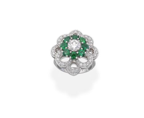 GRAFF: EMERALD AND DIAMOND FLOWER RINGSet with brilliant-cut diamonds, weighing 2.04 carats total, and circular-cut emeralds,