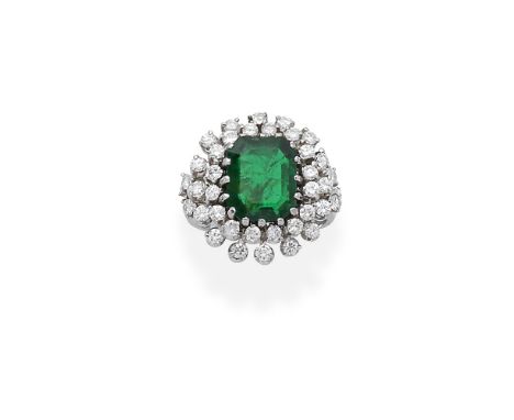 EMERALD AND DIAMOND RINGThe step-cut emerald within a tiered surround of brilliant-cut diamonds, diamonds approx. 0.90ct, rin