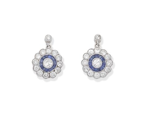 SAPPHIRE AND DIAMOND EARRINGSEach brilliant-cut diamond surmount suspending a target cluster of calibré-cut sapphires and bri