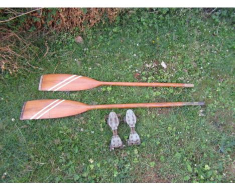 2 Wooden boat ores and vintage roller skates 