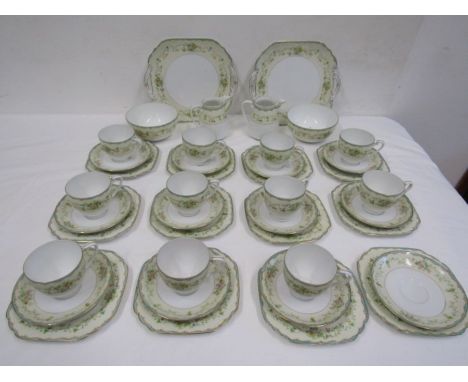 Noritake part tea service comprising 2 cake plates, 12 sandwich plates, 12 saucers, 11 cups, 2 milk jugs and 2 sugar bowls