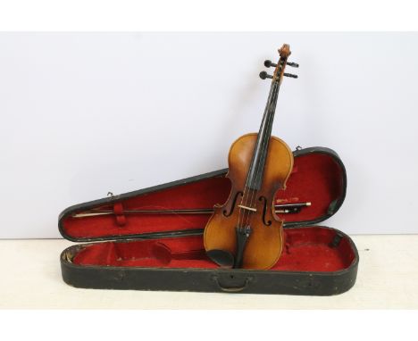 Antique violin with two piece back, Antonius Stradivarius Cremonensis paper label to interior, with bow with MOP detail, case