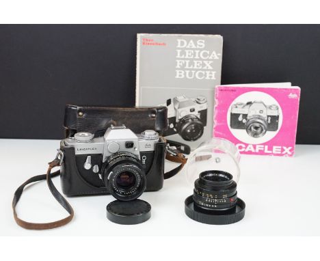 A vintage Leitz Wetzlar Leicaflex 35mm camera with two lenses case and associated paperwork. 