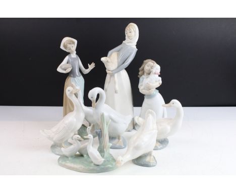 Collection of Lladro figurines to include girl carrying lamb, B208, H 27cm, Girl feeding goose, 1052, H 24cm, Nao girl and la