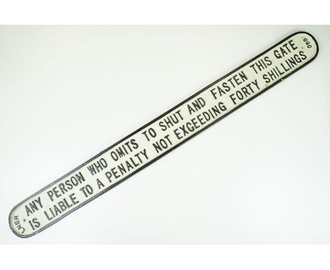 Vintage style cast sign 'Any person who omits to shut and fasten this gate is liable to a penalty not exceeding forty shillin