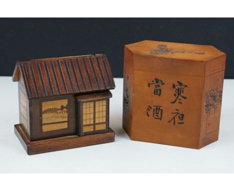 Chinese wooden tea caddy of hexagonal form, carved with landscape scene panels and calligraphy, 10.5cm high together with a J