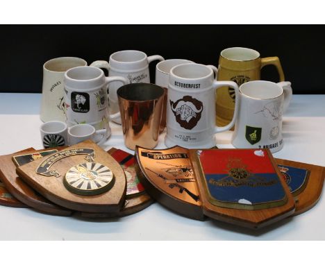 Assortment of commemorative ceramic tankard mugs and trophy shields to include Rhodesia Artillery, Round tables in Central Af