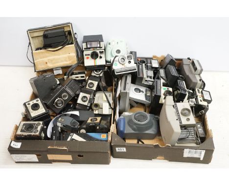 A large collection of polaroid Instant cameras including various collectable Polaroid 600s and SX-70 models 