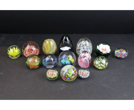 Selection of glass paperweights in varying sizes, to include millefiori, Caithness 'Moon crystal' and Caithness egg shaped en