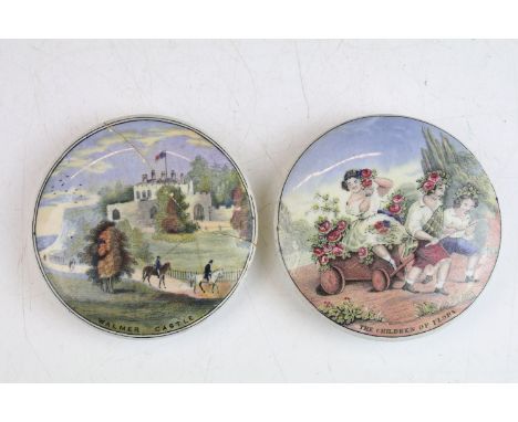 Antique Prattware pot lids, one depicting 'Walmer Castle' with outside scene, the other 'The children of flora' diameter 10cm