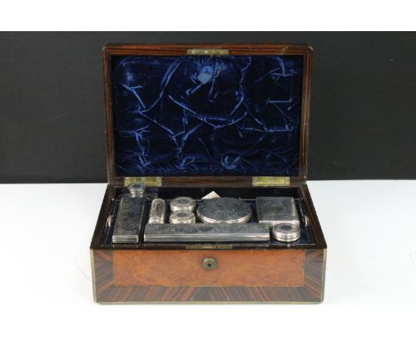 Late 19th century Victorian walnut vanity box containing silver hallmarked lidded bottles and cases with cut glass bases, two