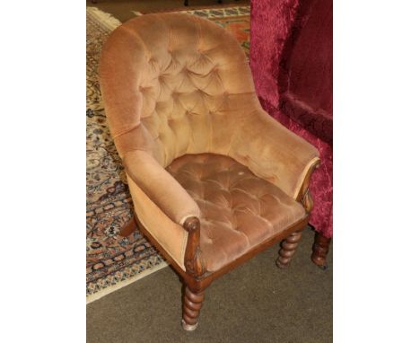A Victorian button-back tub chair 