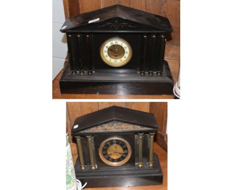 A Victorian black slate striking mantel clock with a Victorian black slate mantel timepiece 
