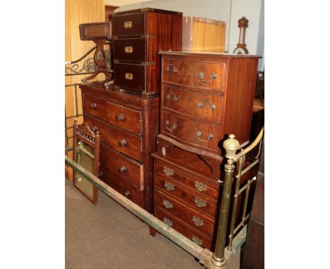 A Victorian mahogany five drawer bow-fronted chest, three reproduction chest of drawers, a dressing table mirror and a reprod