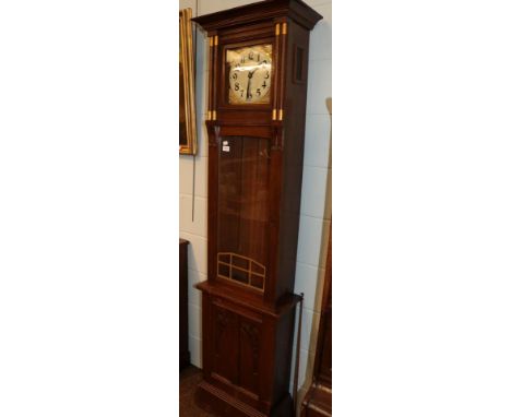 A 1930's veneered oak double weight driven longcase clock 