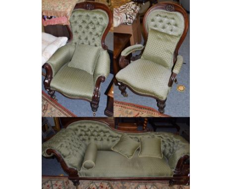 A three-piece Victorian mahogany frame suite recovered in buttoned green fabric comprising a scroll end sofa, a lady's armcha