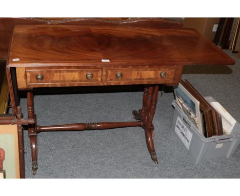 A reproduction mahogany and ebony strung sofa table 