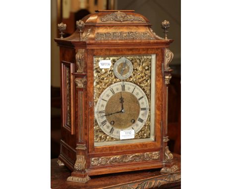 A late Victorian walnut quarter striking table clock, movement back plate stamped Lenzkirch