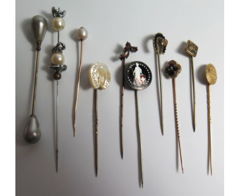 Collection of Stick pins including 14ct gold pin decorated with Chinese dragon