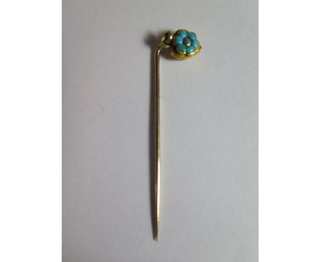 A Precious Yellow Metal Stick Pin with turquoise set heart shaped finial